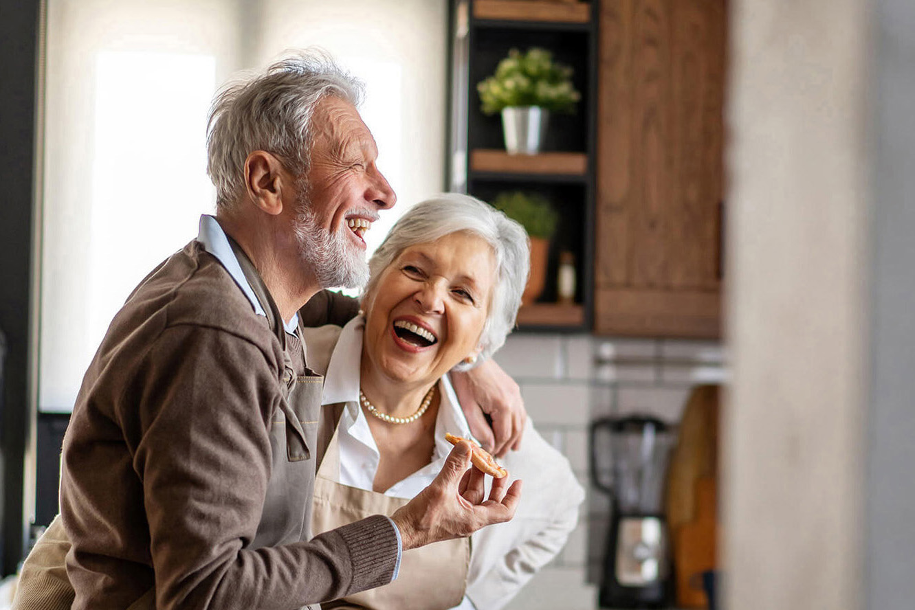 Happy senior couple during the meeting with a financial consultant